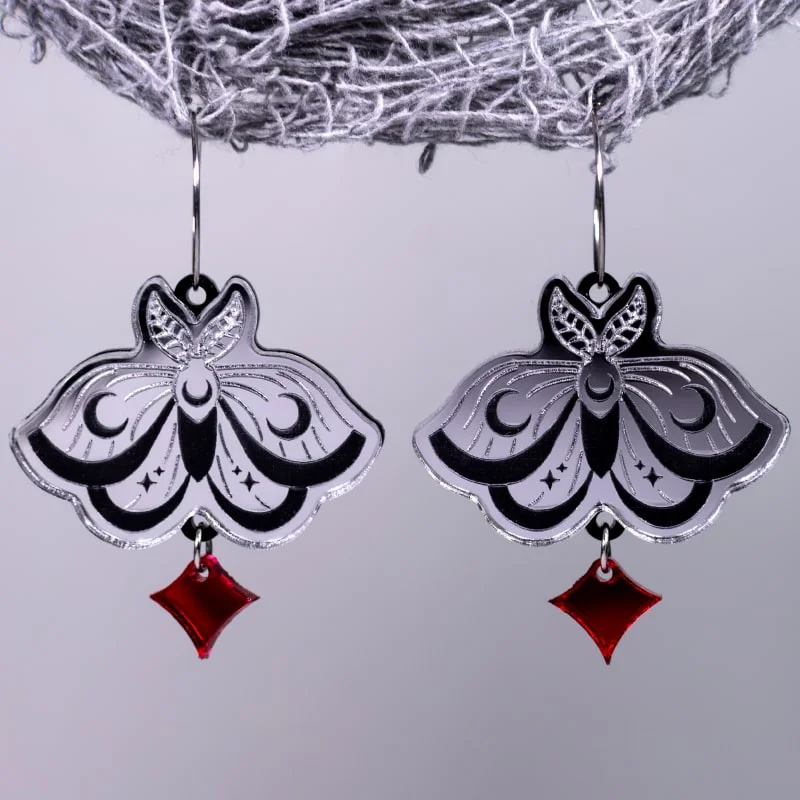 Pendientes polillas espejo con brillante rojo Pendientes polillas espejo con brillante rojo