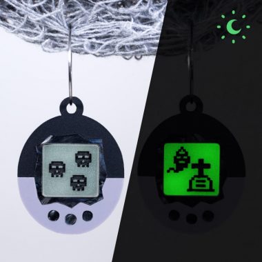 Pendientes tamatgotchi virtual pet brilla en la oscuridad