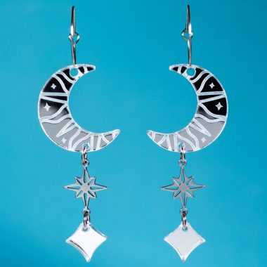 Pendientes acrílicos de verano con eclipse lunar efecto espejo plateado Pendientes acrílicos de verano con eclipse lunar efecto espejo plateado
