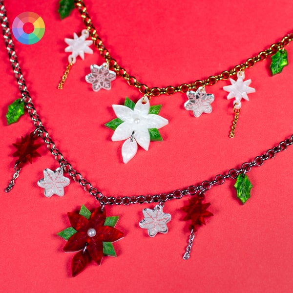 Collar acero inoxidable con flor de pascua. Accesorio moda para navidad